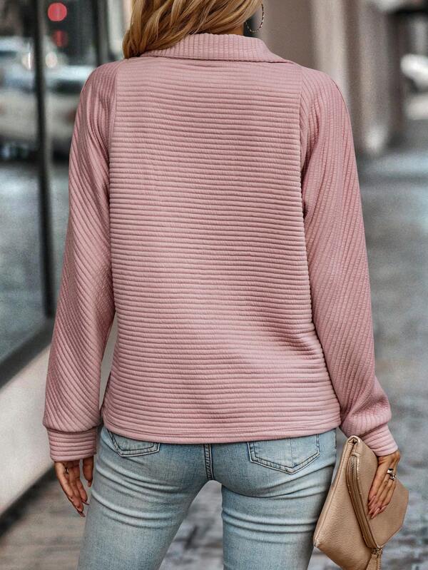 Mia | Stylish women's sweater with V-neck, high collar, and zipper detail